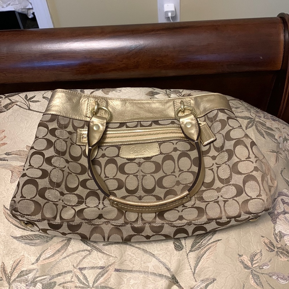 Gold coach bag